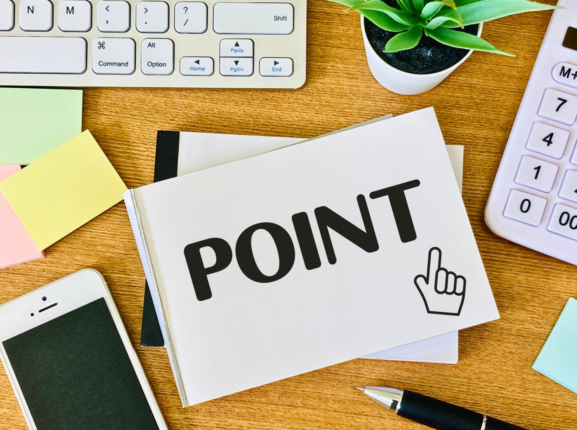 ノートに「POINT」という文字と指差しのイラストが書かれた画像